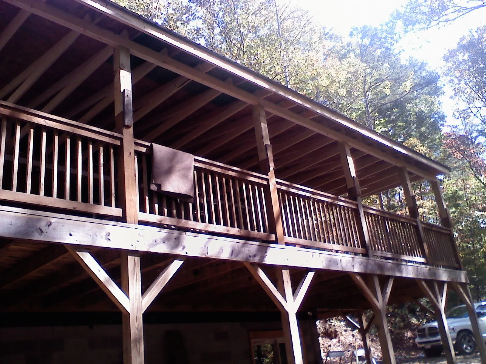 Timber framing under a new elevated porch and deck — Roof Leak Repair in Walhonding by Roofing Brothers